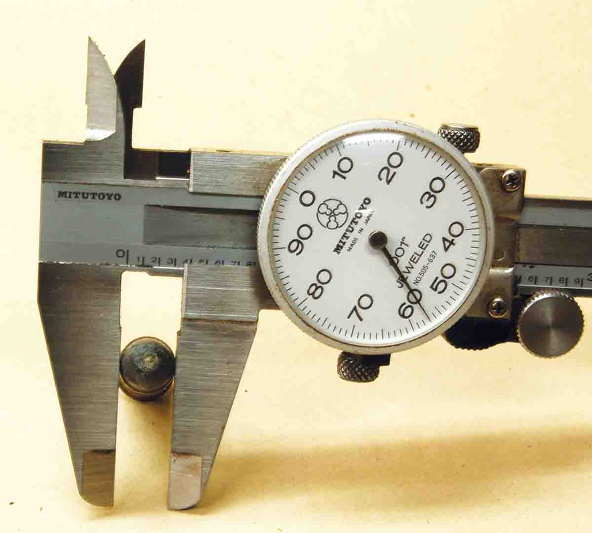 The caliper shows an inside bullet diameter of .357 inch (.35-caliber bullet) of a .38 Colt Army cartridge that would later be called a .38 Long Colt.